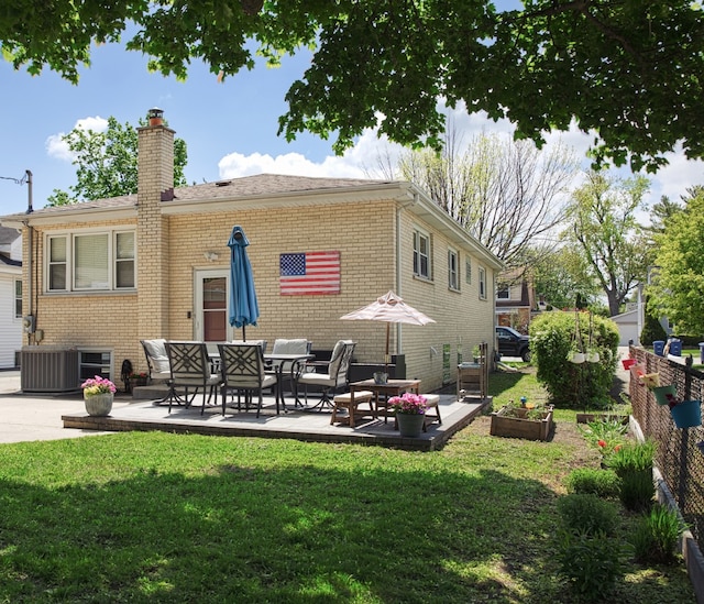 1080 E Prairie Ave, Des Plaines, IL 60016 - back of house featuring brick siding, a chimney, a patio, and cooling unit