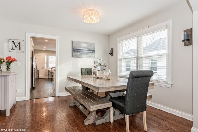 1080 E Prairie Ave, Des Plaines, IL 60016 - dining space with dark wood-style flooring, baseboards, and a chandelier