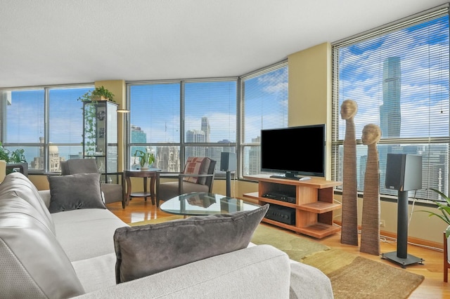 405 N Wabash Ave Unit 4709, Chicago, IL 60611 - living area featuring a wall of windows, wood finished floors, and healthy amount of natural light