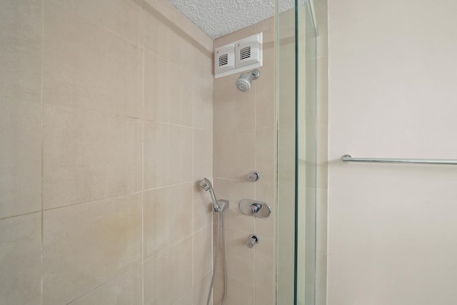 405 N Wabash Ave Unit 4709, Chicago, IL 60611 - full bath featuring a stall shower and a textured ceiling