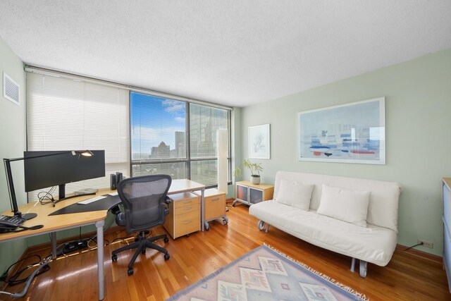 405 N Wabash Ave Unit 4709, Chicago, IL 60611 - office space featuring wood finished floors and a textured ceiling