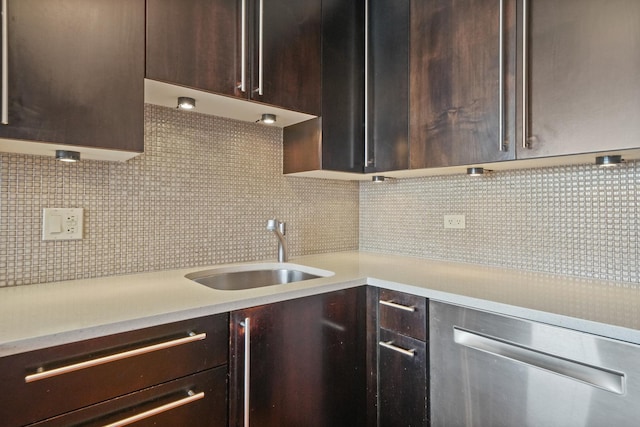 405 N Wabash Ave Unit 4709, Chicago, IL 60611 - kitchen featuring a sink, dark brown cabinetry, light countertops, and tasteful backsplash
