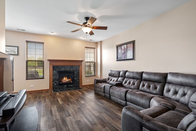 1020 Heron Cir, Joliet, IL 60431 - living room with plenty of natural light, ceiling fan, dark wood-style floors, and baseboards