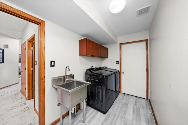 11731 Blackburn Dr, Orland Park, IL 60467 - laundry room with washing machine and dryer, cabinet space, and baseboards