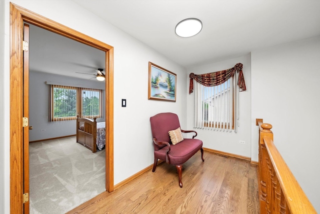 11731 Blackburn Dr, Orland Park, IL 60467 - sitting room with baseboards, light wood-style floors, and ceiling fan