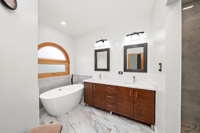 11731 Blackburn Dr, Orland Park, IL 60467 - bathroom with marble finish floors, double vanity, a soaking tub, tile walls, and a tile shower