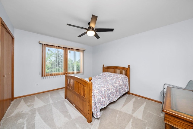 11731 Blackburn Dr, Orland Park, IL 60467 - bedroom featuring baseboards, light colored carpet, a closet, and ceiling fan