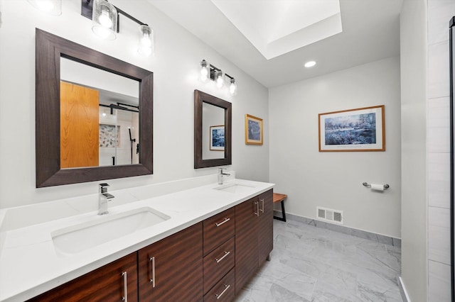 11731 Blackburn Dr, Orland Park, IL 60467 - bathroom featuring marble finish floors, a skylight, double vanity, baseboards, and recessed lighting