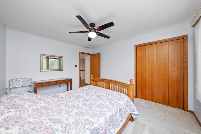 11731 Blackburn Dr, Orland Park, IL 60467 - carpeted bedroom with a closet and a ceiling fan