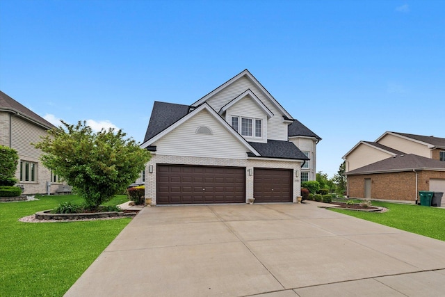 11731 Blackburn Dr, Orland Park, IL 60467 - traditional-style home with driveway, brick siding, a front lawn, and a garage