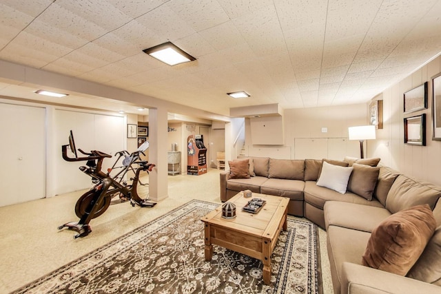 living area featuring stairway