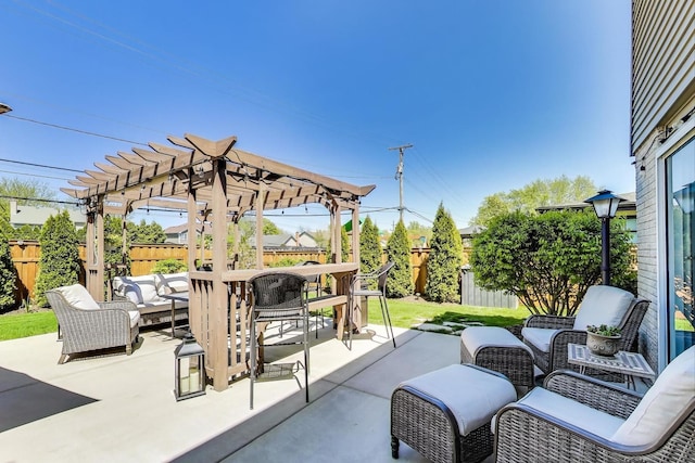 view of patio / terrace featuring outdoor lounge area, a pergola, and a fenced backyard