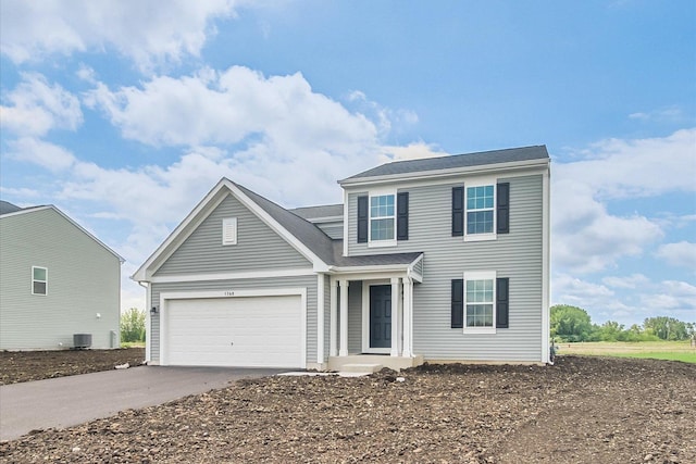 1768 Breton Ave, North Aurora, IL 60542 - view of front of house featuring driveway and a garage