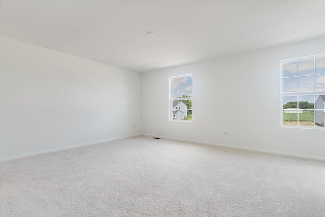 1768 Breton Ave, North Aurora, IL 60542 - spare room featuring light carpet