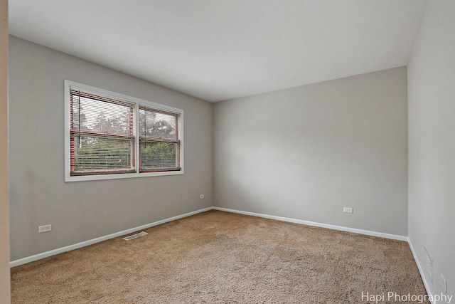 25269 W Anderson St, Ingleside, IL 60041 - carpeted empty room featuring baseboards