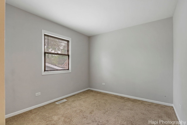 25269 W Anderson St, Ingleside, IL 60041 - carpeted empty room featuring baseboards