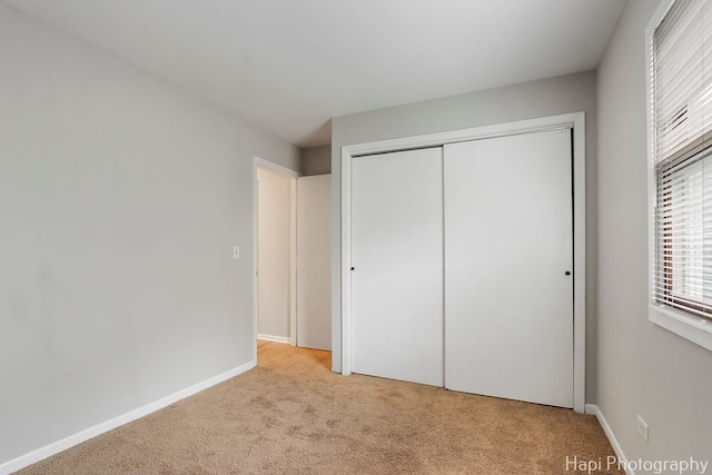 25269 W Anderson St, Ingleside, IL 60041 - unfurnished bedroom featuring carpet, a closet, and baseboards