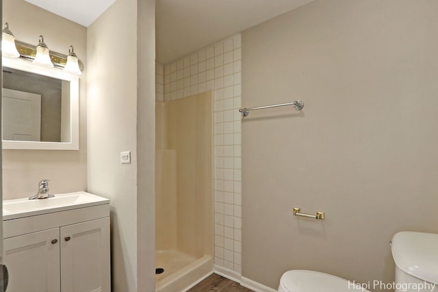 25269 W Anderson St, Ingleside, IL 60041 - bathroom with toilet, a shower stall, vanity, and wood finished floors