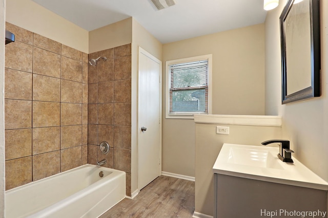 25269 W Anderson St, Ingleside, IL 60041 - bathroom featuring wood finished floors, shower / tub combination, vanity, and baseboards