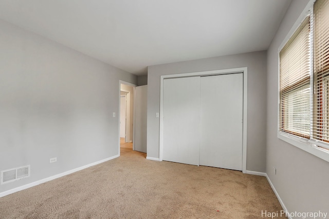 25269 W Anderson St, Ingleside, IL 60041 - unfurnished bedroom with carpet floors, baseboards, and a closet