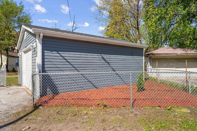 detached garage with fence