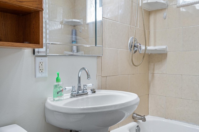bathroom featuring a sink and toilet