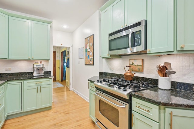 1031 S Humphrey Ave, Oak Park, IL 60304 - kitchen with appliances with stainless steel finishes, green cabinetry, baseboards, and recessed lighting
