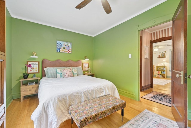 1031 S Humphrey Ave, Oak Park, IL 60304 - bedroom featuring crown molding, wood finished floors, and ceiling fan