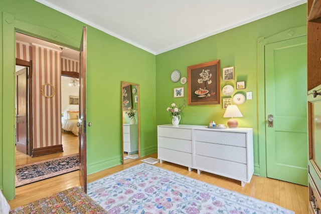 1031 S Humphrey Ave, Oak Park, IL 60304 - bedroom with light wood-type flooring and ornamental molding