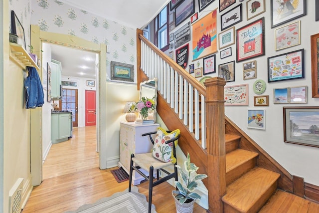 1031 S Humphrey Ave, Oak Park, IL 60304 - staircase with wood finished floors, baseboards, and wallpapered walls