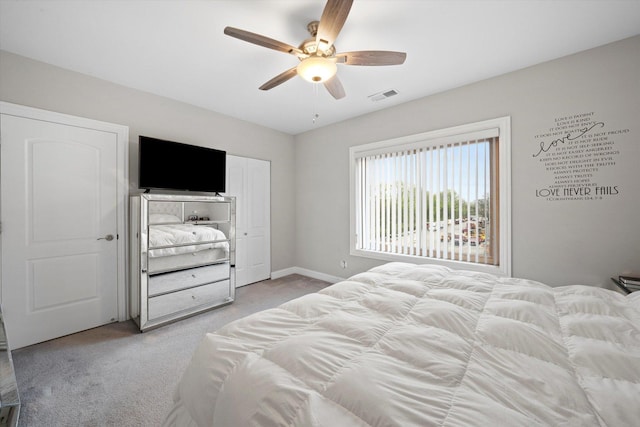 11001 Deblin Ln Unit 307, Oak Lawn, IL 60453 - bedroom with light carpet, ceiling fan, and baseboards