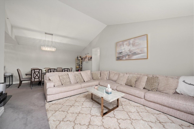 11001 Deblin Ln Unit 307, Oak Lawn, IL 60453 - living area featuring carpet, vaulted ceiling, and a chandelier