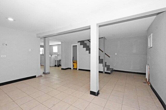 6409 S Champlain Ave, Chicago, IL 60637 - below grade area featuring light tile patterned floors, stairs, recessed lighting, and baseboards
