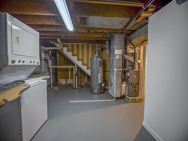 unfinished below grade area with stacked washer / dryer, water heater, and stairway