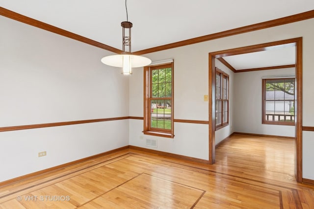 341 Breckenridge Dr, Aurora, IL 60504 - empty room with baseboards, light wood-type flooring, and crown molding