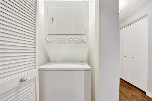 1910 S State St Unit 231, Chicago, IL 60616 - washroom with stacked washer / drying machine and wood finished floors