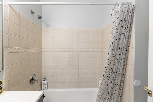 full bath featuring shower / tub combo with curtain and vanity