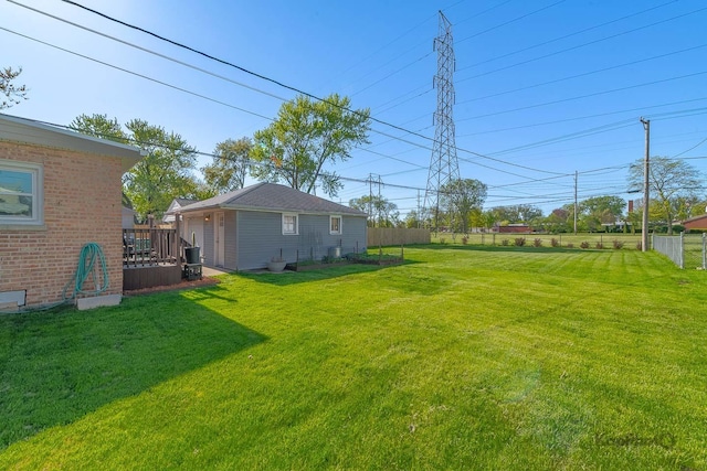 view of yard with a wooden deck