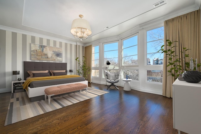 2054 N Mohawk St, Chicago, IL 60614 - bedroom featuring wallpapered walls, wood finished floors, a chandelier, and baseboards