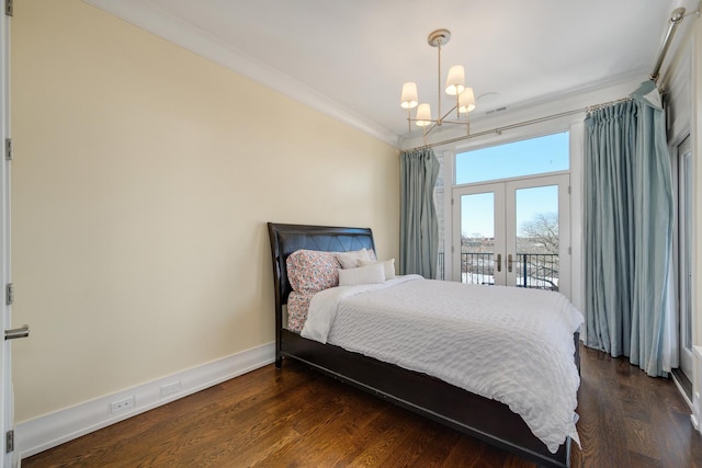 2054 N Mohawk St, Chicago, IL 60614 - bedroom featuring crown molding, french doors, access to outside, a chandelier, and baseboards