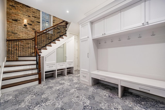 2054 N Mohawk St, Chicago, IL 60614 - mudroom featuring brick wall, recessed lighting, and carpet flooring