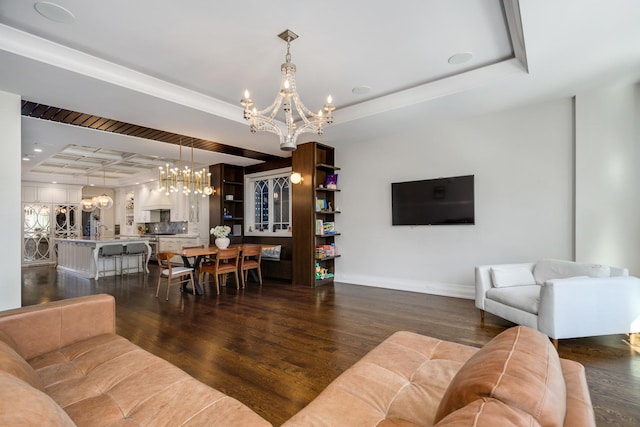 2054 N Mohawk St, Chicago, IL 60614 - living room featuring a chandelier, a tray ceiling, and dark wood finished floors