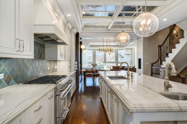 2054 N Mohawk St, Chicago, IL 60614 - kitchen with a chandelier, high end range, custom range hood, a sink, and coffered ceiling