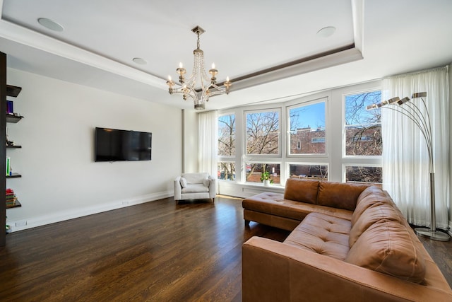 2054 N Mohawk St, Chicago, IL 60614 - living area featuring a tray ceiling, a chandelier, dark wood-style floors, and baseboards