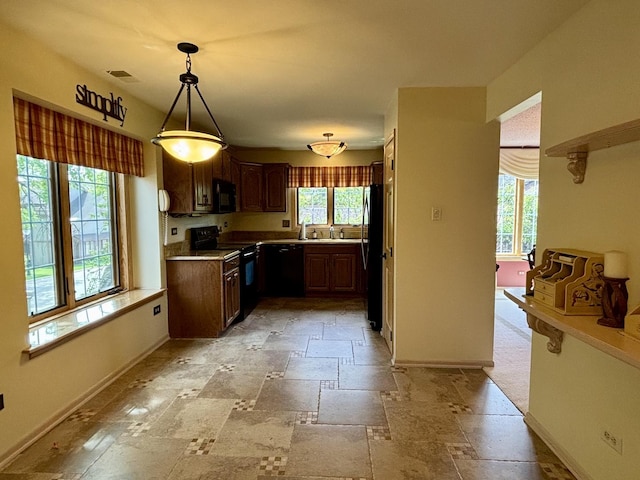 13464 S Westview Dr Unit 4, Palos Heights, IL 60463 - kitchen with black appliances, baseboards, stone tile floors, and light countertops
