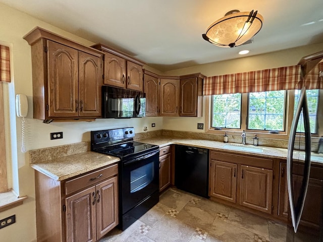 13464 S Westview Dr Unit 4, Palos Heights, IL 60463 - kitchen with black appliances, a sink, and light countertops