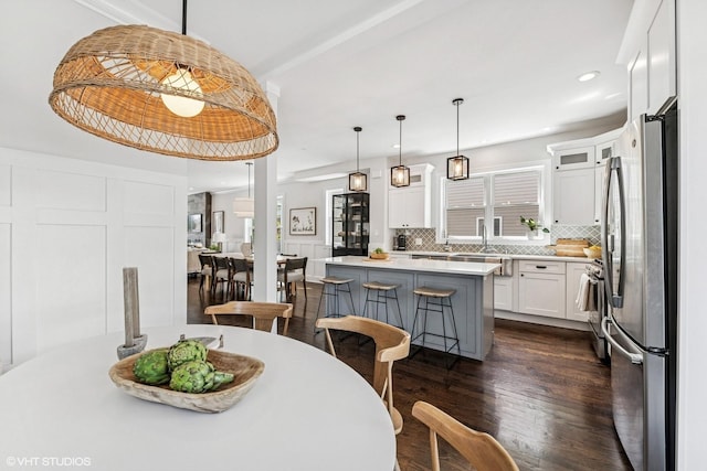 4328 N Ridgeway Ave, Chicago, IL 60618 - dining area featuring dark wood-type flooring and recessed lighting