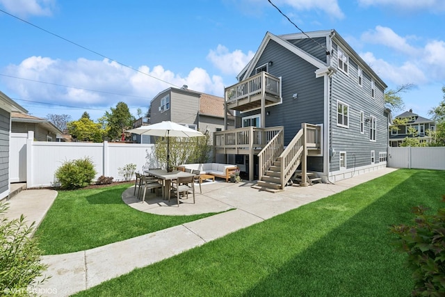 4328 N Ridgeway Ave, Chicago, IL 60618 - rear view of property with a balcony, outdoor lounge area, and a patio