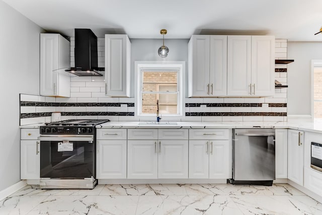 8109 S Marquette Ave, Chicago, IL 60617 - kitchen with range with gas stovetop, wall chimney range hood, stainless steel dishwasher, and healthy amount of natural light