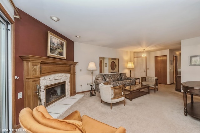 803 Persimmon Ln Unit A, Mount Prospect, IL 60056 - living room with light carpet, a stone fireplace, and baseboards